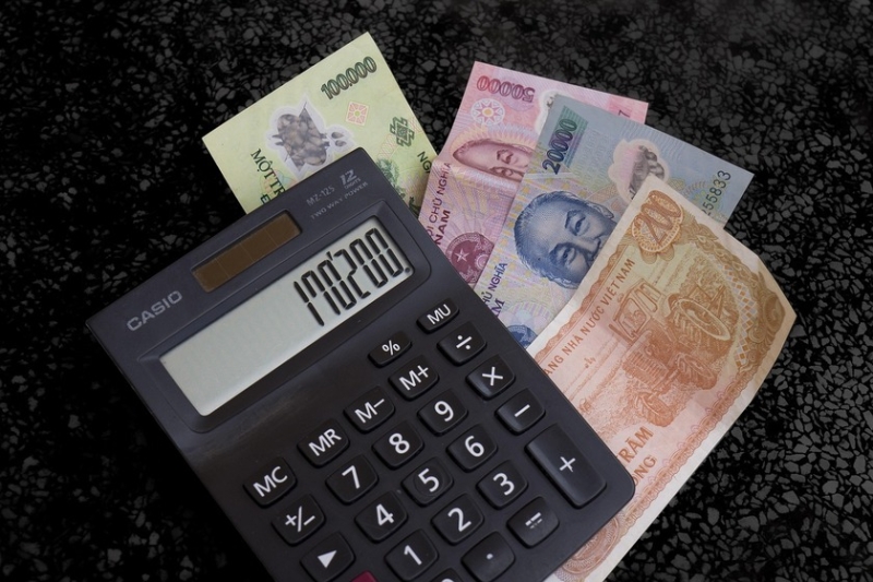 Which currency is better to travel to Vietnam with and where to change it?